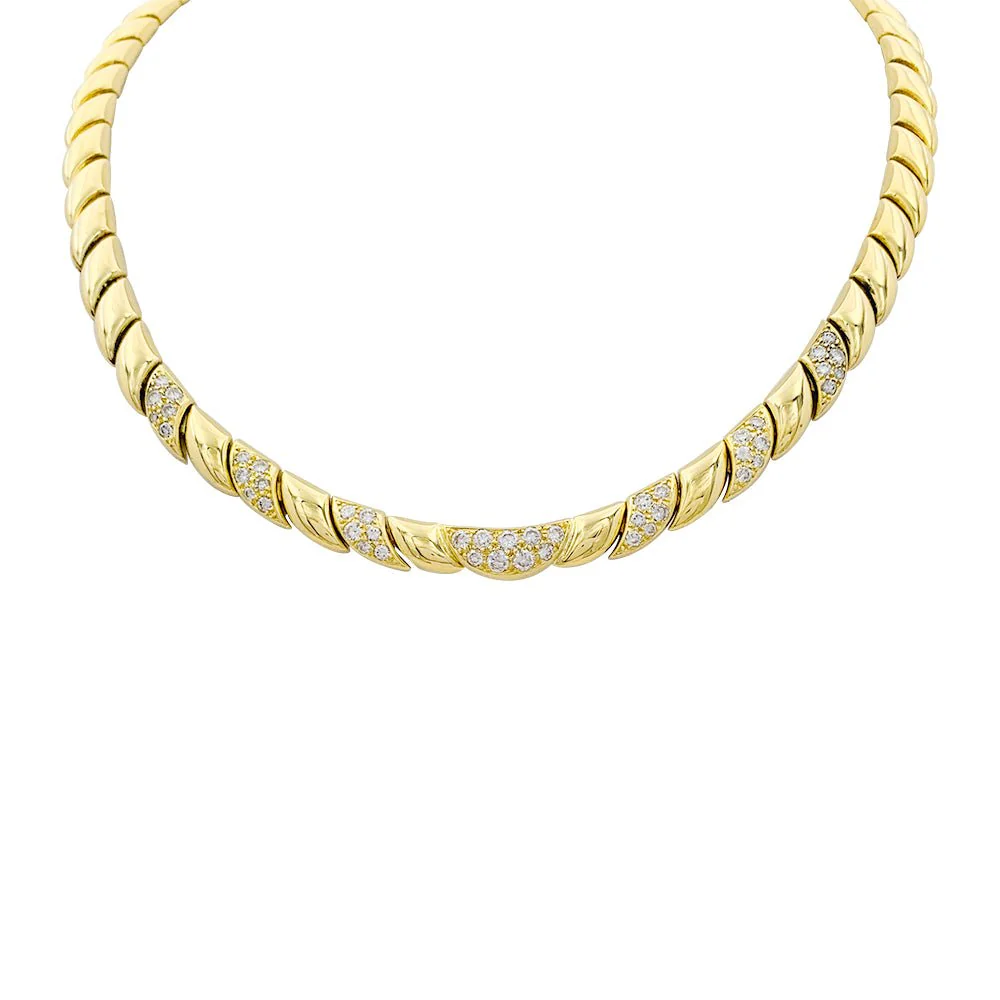Collier Patek Philippe or jaune, diamants.