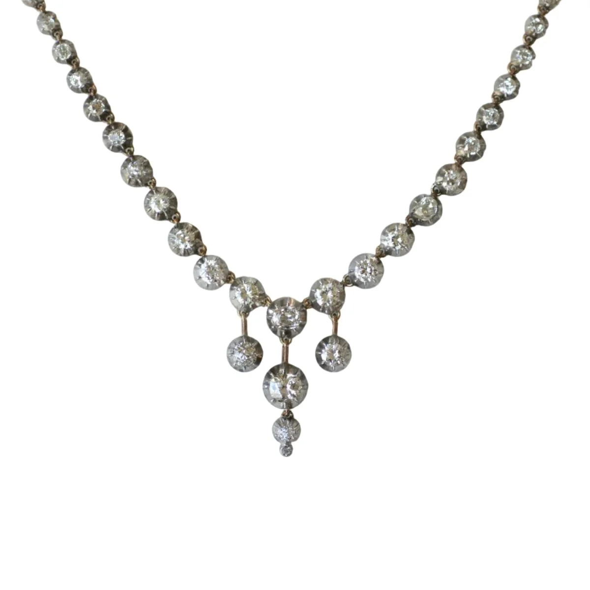 Collier Rivière en or jaune, or rose, argent et diamants