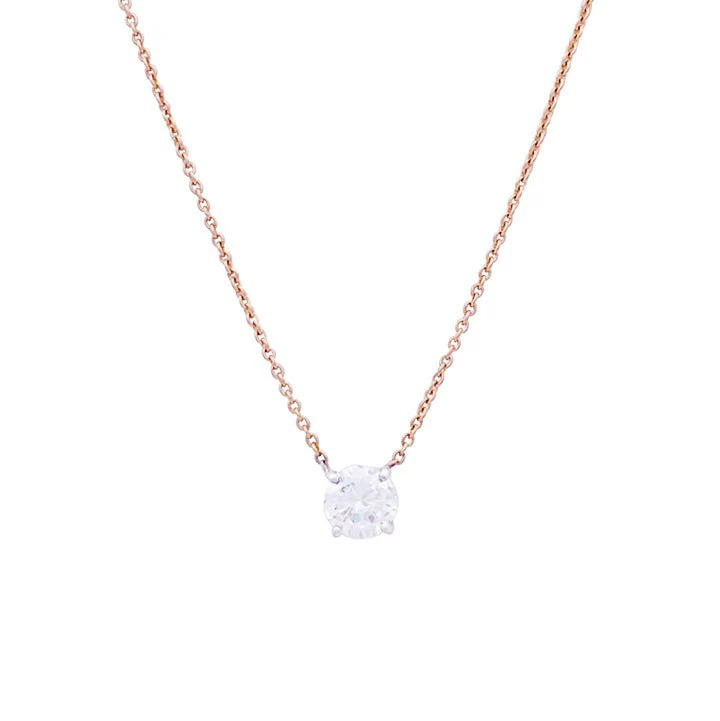 Collier solitaire deux ors, diamants.