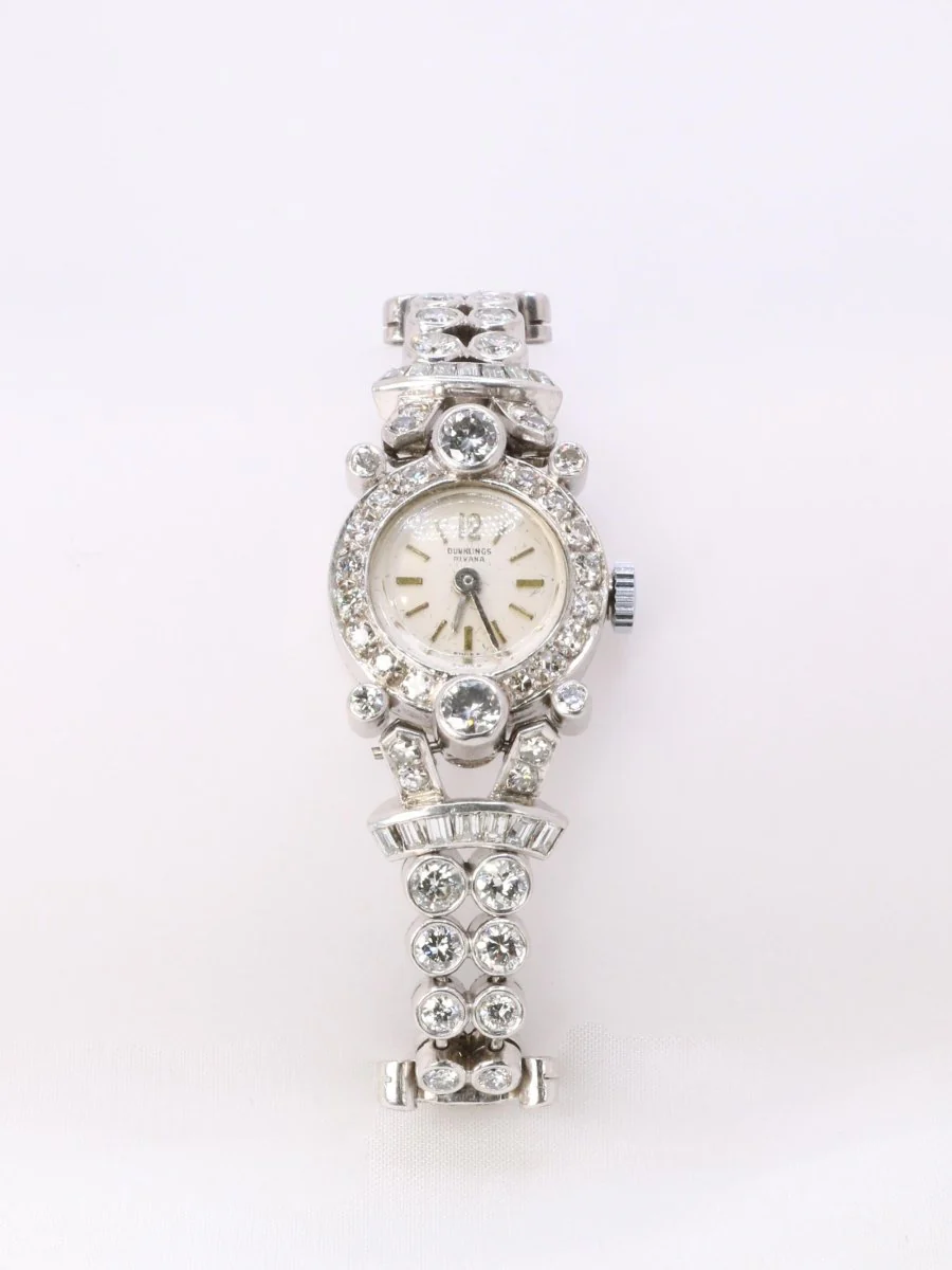 Montre Art Deco or blanc platine diamants