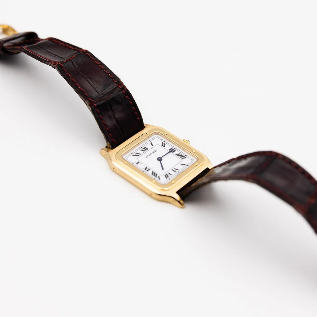 Montre CARTIER "Santos-Dumont" en or jaune et cuir