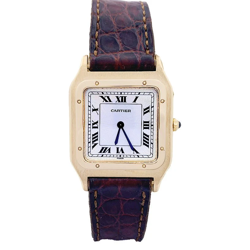 Montre Cartier ,"Santos Dumont", or jaune, cuir.