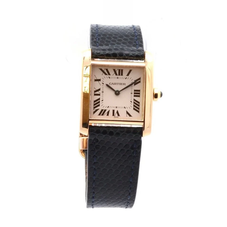 Montre CARTIER "Tank" en or jaune, cuir, saphir et quartz