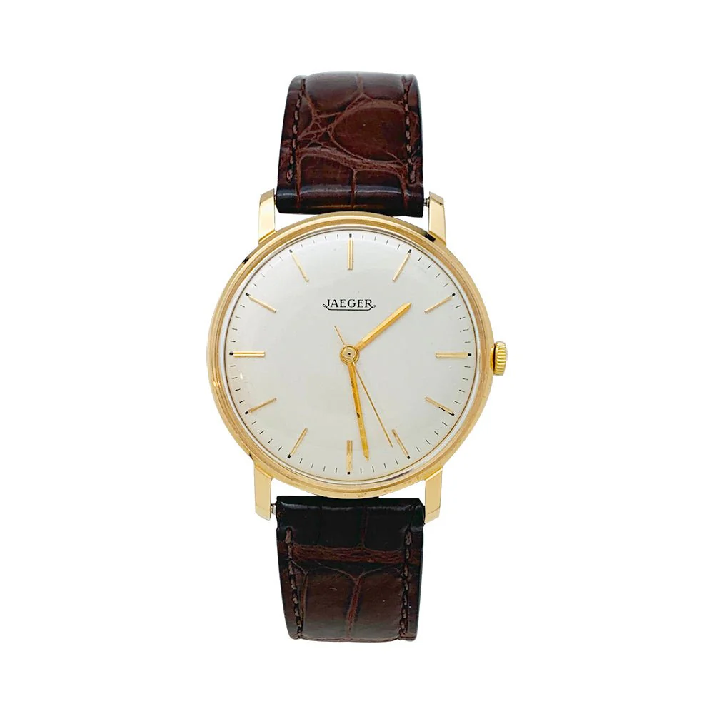 Montre Jaeger en or rose, bracelet cuir.