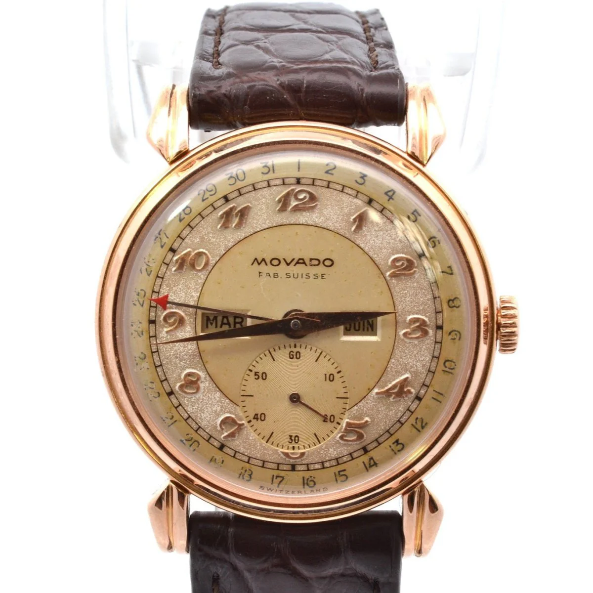 Montre MOVADO "Triple Calendar" en or jaune, plexi et cuir