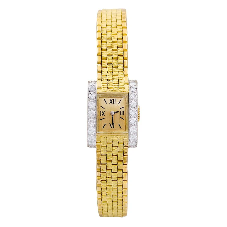 Montre vintage André Col, or jaune, platine, diamants.