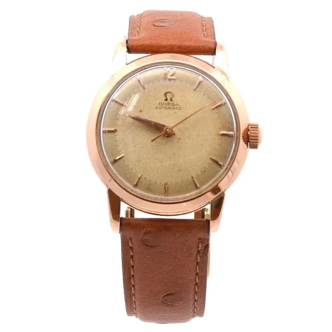 Montre OMEGA "Cal.501" en or jaune et cuir