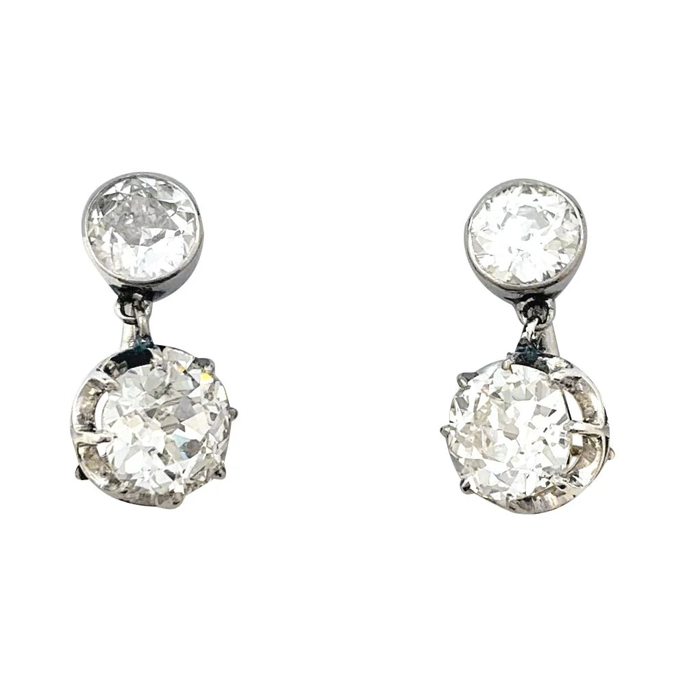 Boucles d'oreilles Dormeuses en or rose, platine et diamants