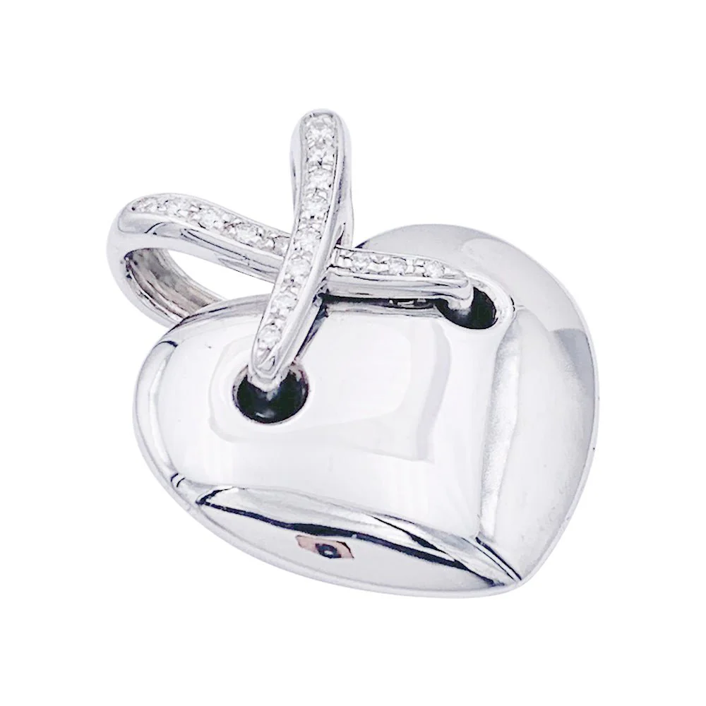 Pendentif coeur Chaumet, collection "Liens", or blanc et diamants.