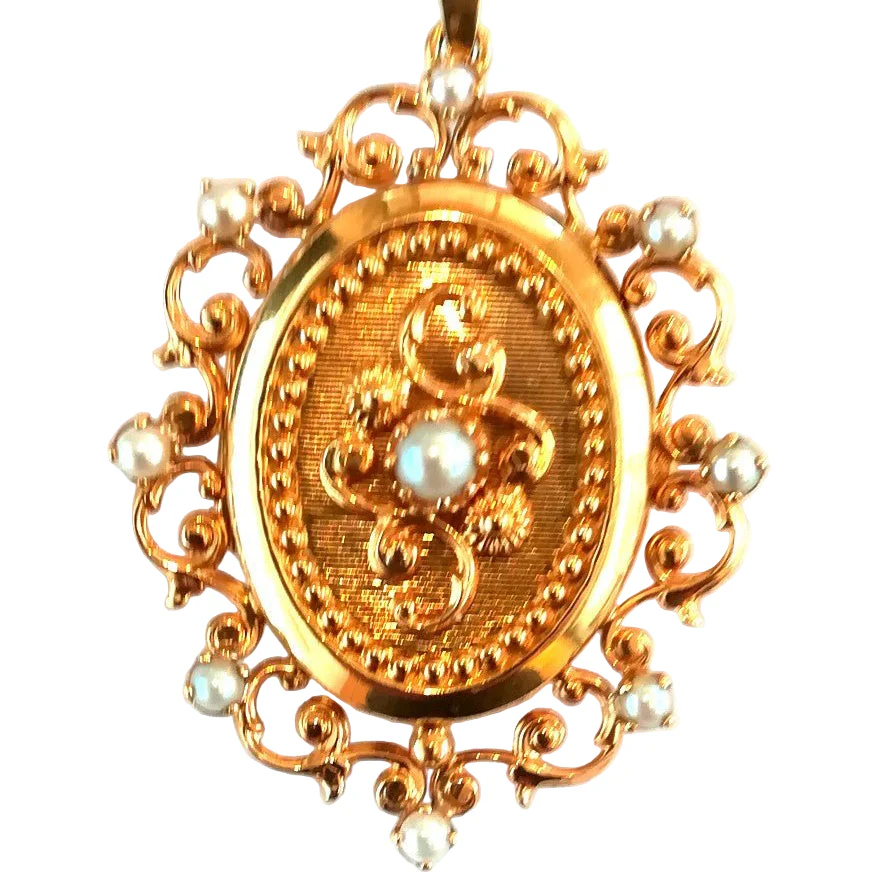 Pendentif porte photo en or jaune et perles