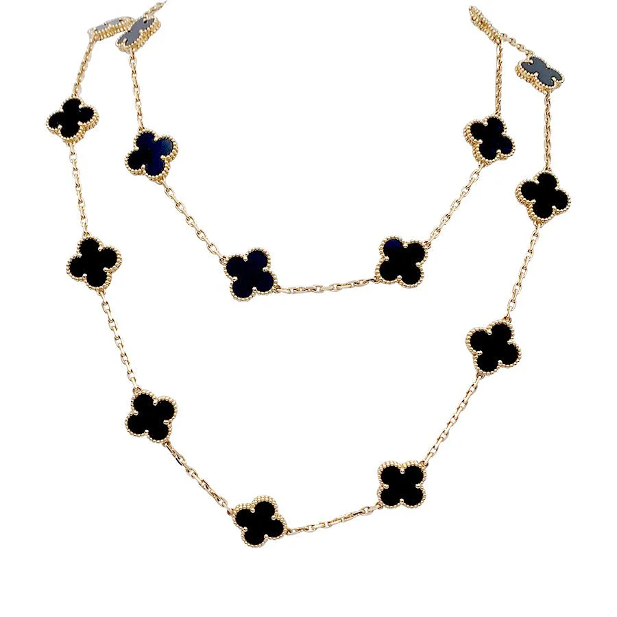 Sautoir Van Cleef & Arpels, "Vintage Alhambra", or jaune, onyx