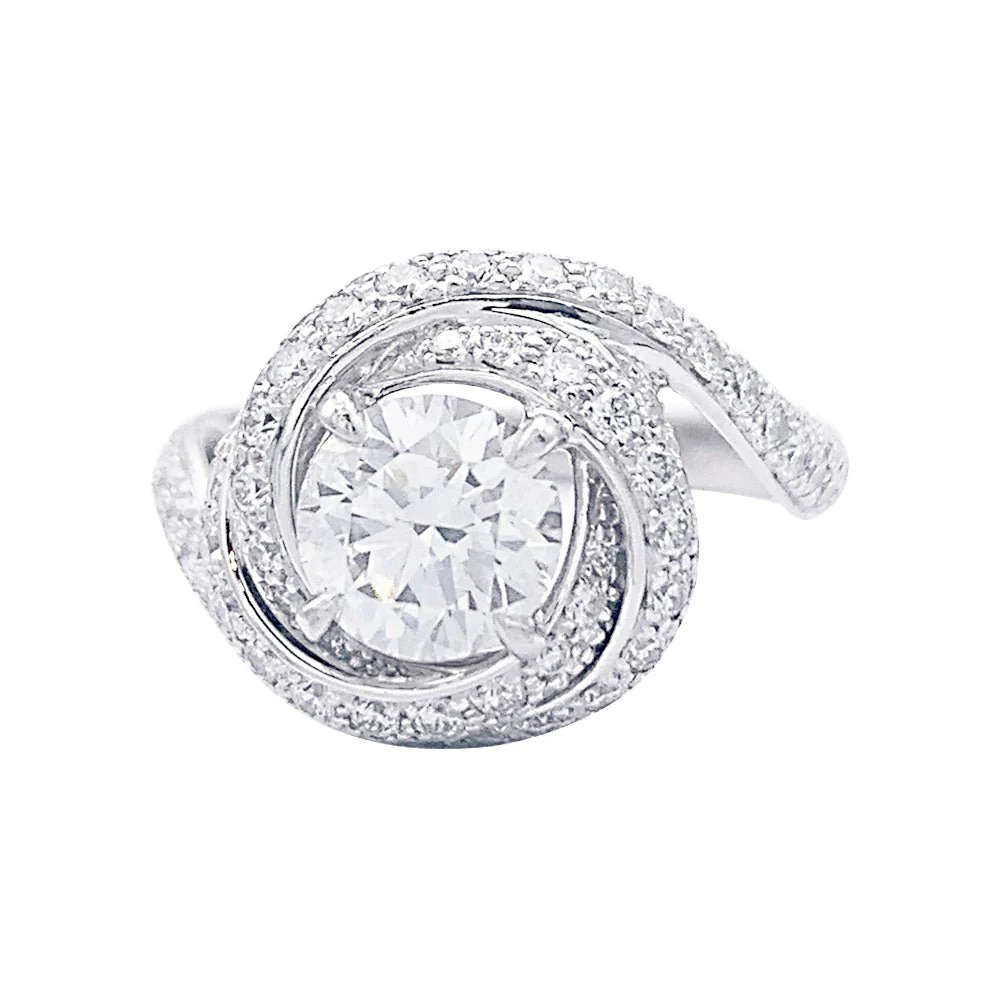 Solitaire Cartier, "Trinity Ruban", platine et diamants.